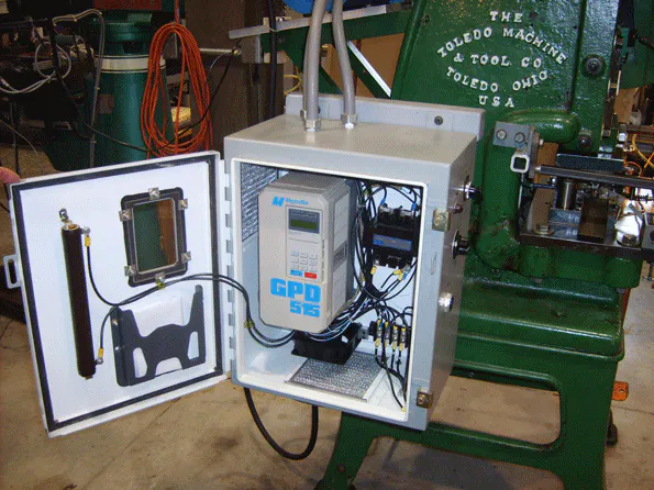 Turn-of-the-century stamping press gets new life with variable-speed ...