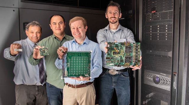 Sandia National Laboratories researchers (from left) Steve Verzi, William Severa, Brad Aimone and Craig Vineyard hold different versions of neuromorphic hardware platforms.