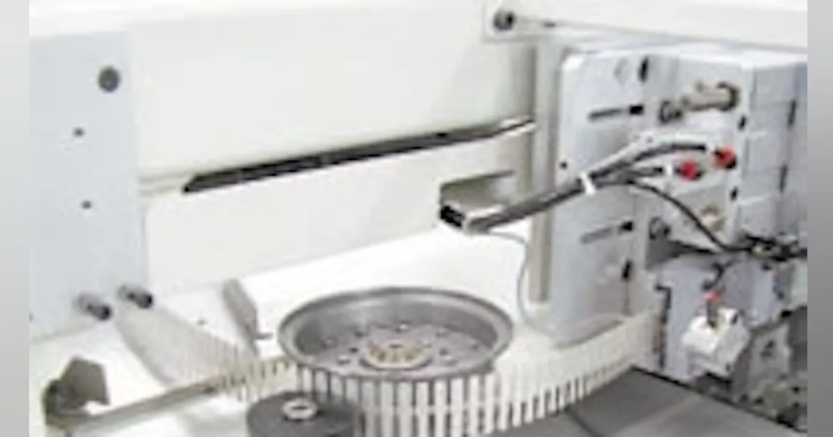 Tab inserters use couplings for smooth operation | Machine Design