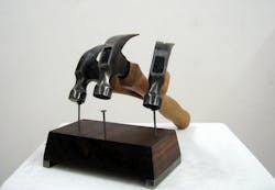 Nimer Aleckrsquos art includes a threeheaded hammer Nimer Aleckrsquos art includes a threeheaded hammer