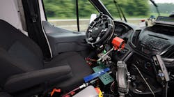 Robotic system for autonomous test drives designed by Autonomous Solutions Inc., inside a Ford van.
