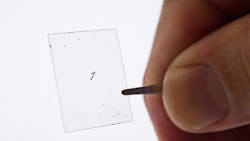 Layers of molybdenum disulfide MoS2 such as this sample can be fashioned into light flexible and transparent electric generators only a few atoms thick Layers of molybdenum disulfide MoS2 such as this sample can be fashioned into light flexible and transparent electric generators only a few atoms thick
