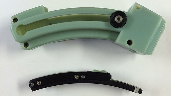 A prototype of a rifle magazine made using hybridized 3D printing consists of has the thermoplastic printed part above combined with a highwear component made of aluminum