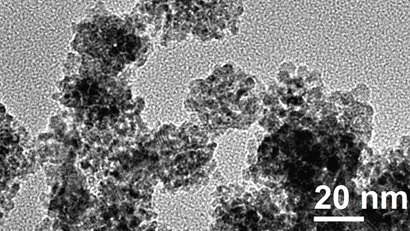 An electron micrograph shows the catalyst on high surface area ceria