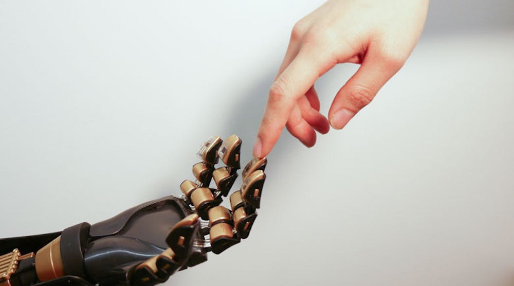 A human finder touches the artificial finger equipped with a Stanford-designed sensor/transmitter that can differentiate between soft, medium, and high pressure levels, then transit them over neural cells to brain cells.