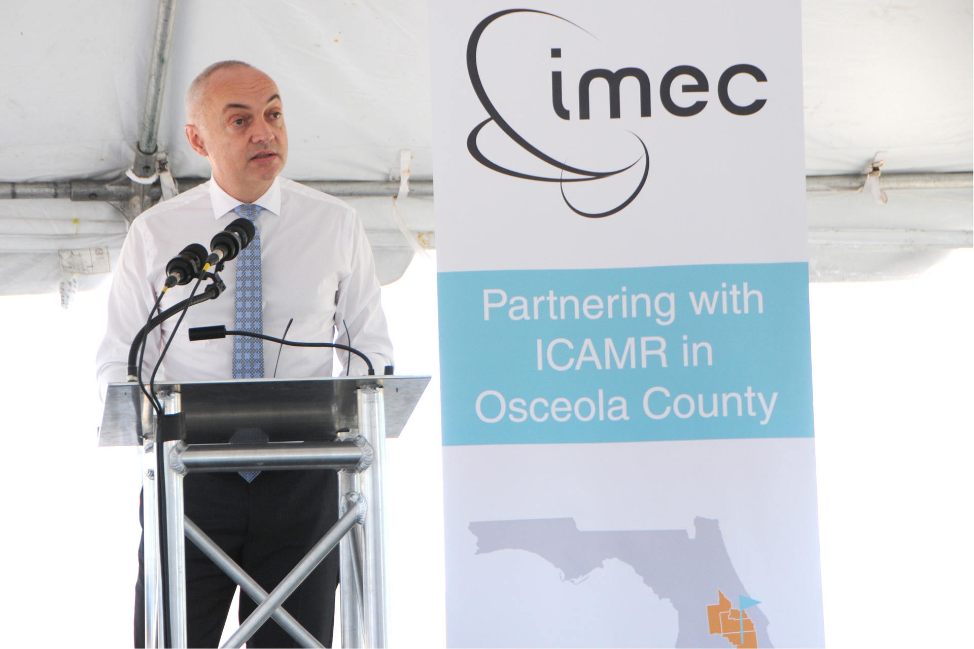 Luc Van den hove CEO of imec announces the opening of a new research facility in Osceola County Florida at the the Florida Advanced Manufacturing Research Center