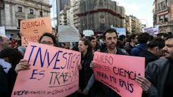 Research staff and union representatives gathered at the science ministry building in Buenos Aires to address CONICET39s denial of fullsalary positions to its workers due to decreased government spending for scientific research in Argentina Research staff and union representatives gathered at the science ministry building in Buenos Aires to address CONICET39s denial of fullsalary positions to its workers due to decreased government spending for scientific research in Argentina