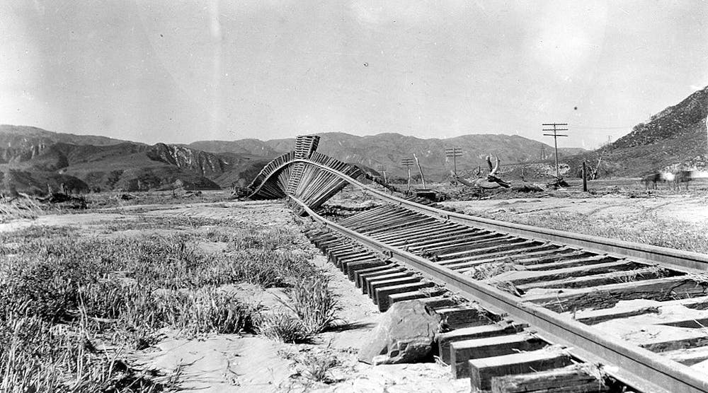 1928- Railroad tracks in southern California warp after flooding due to failure of the St. Francis Dam.