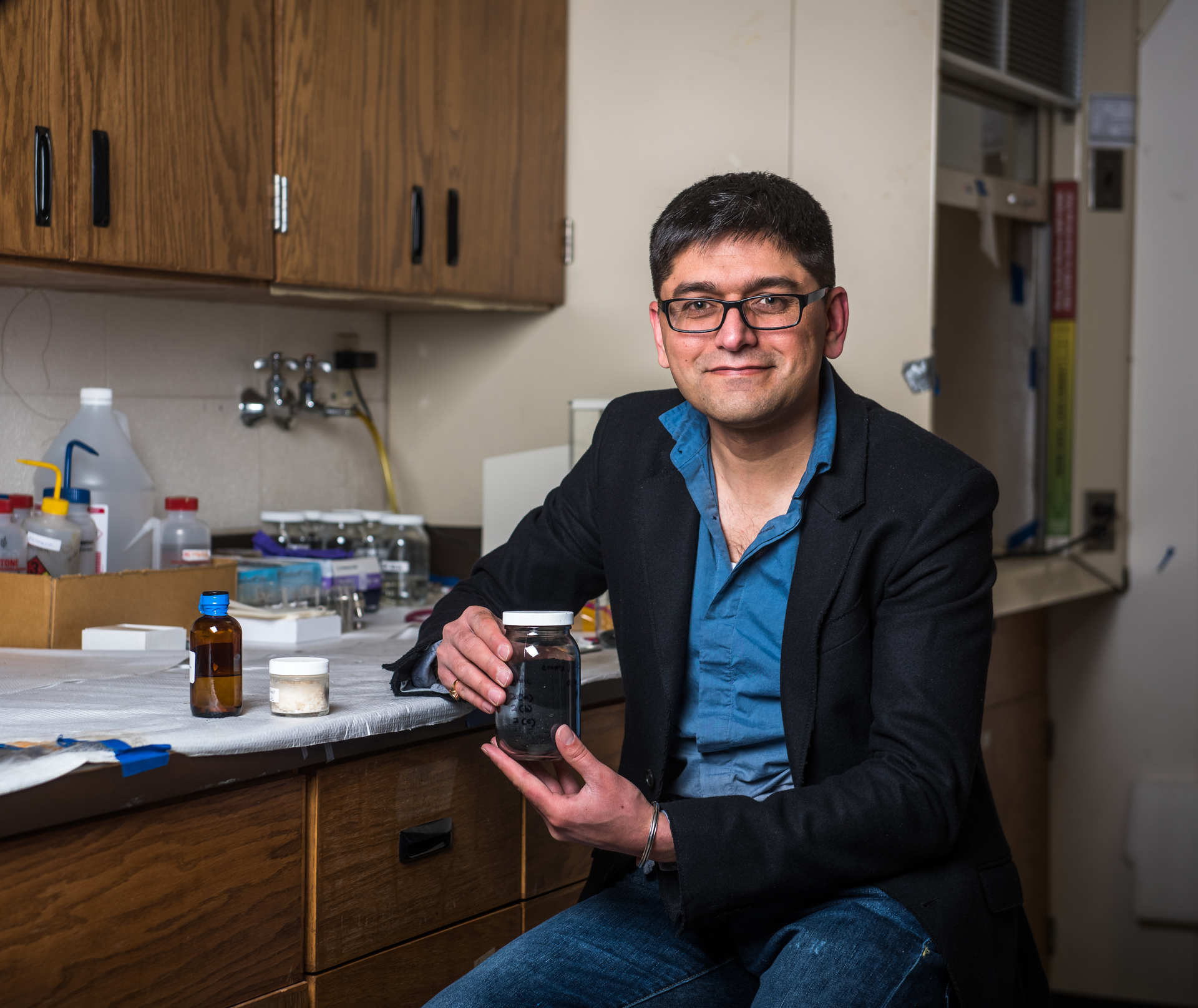 Gurpreet Singh from Kansas State University holds his invented black ceramic derived from a clear liquid silazane polymer enhanced with boron Courtesy of Kansas State University