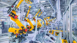 Robotic arms in a car plant