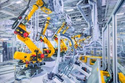 Robotic arms in a car plant Robotic arms in a car plant