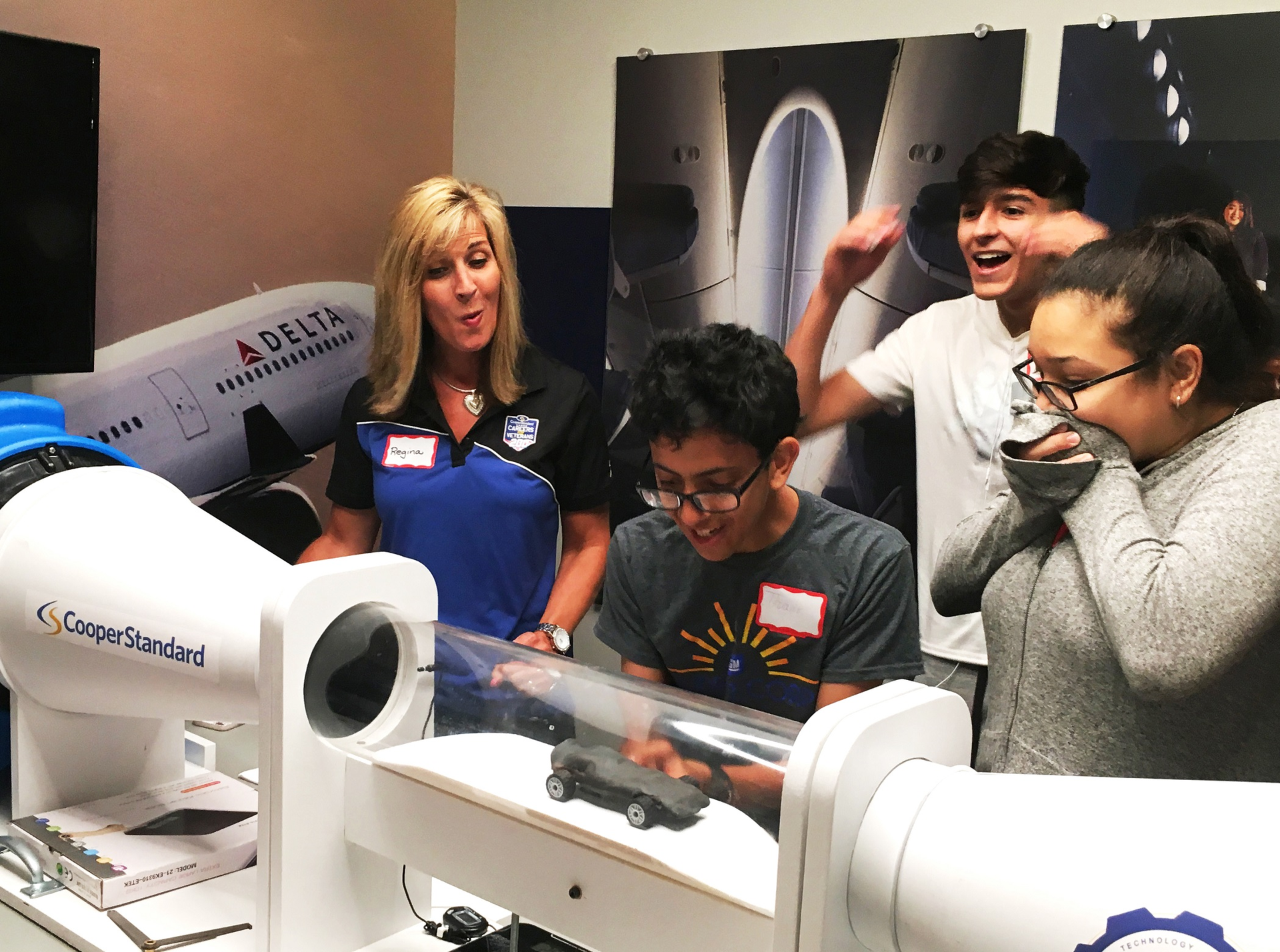 Students testing model racecars