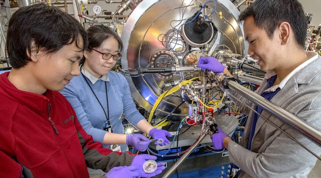 NSLS-II scientist Wen Hu (center) works with MIT researchers Mantao Huang (l) and Aik Jun Tan (r) at the Coherent Soft X-Ray Scattering (CSX) beamline.