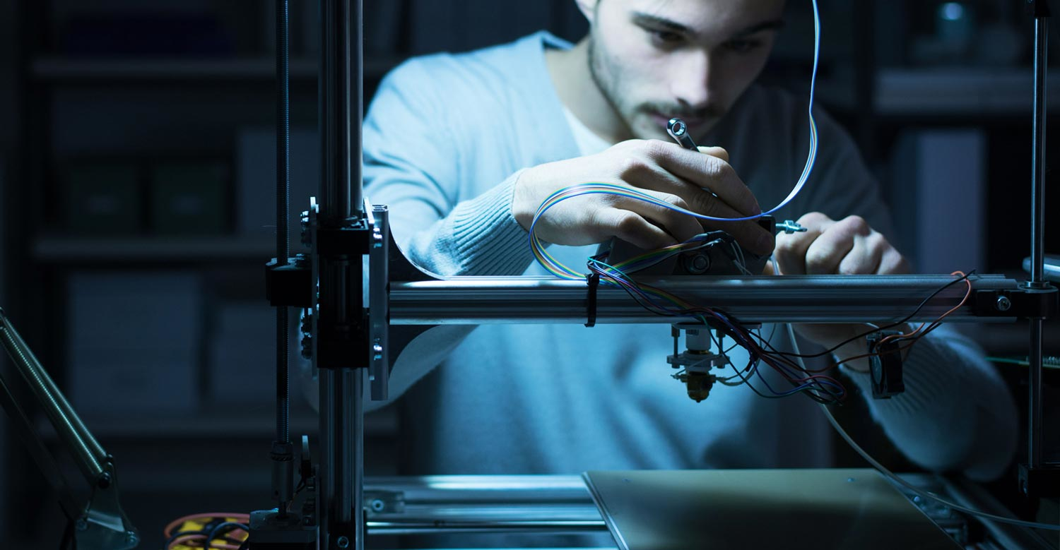 Engineer with 3D printer