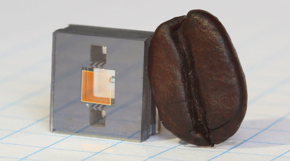 The heart of NIST&rsquo;s next-generation miniature atomic clock ticking at high &ldquo;optical&rdquo; frequencies is this vapor cell on a chip, shown next to a coffee bean for scale. The glass cell (the square window in the chip) contains rubidium atoms, whose vibrations provide the clock &ldquo;ticks.&rdquo; The entire clock consists of three microfabricated chips plus supporting electronics and optics.