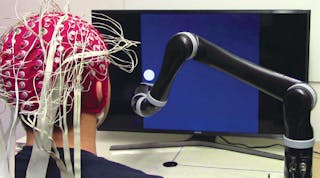 For the first time, a person using a noninvasive brain-computer interface can control a robotic arm that&rsquo;s tracking a cursor on a computer screen and the robotic arm can follow the cursor continuously.
