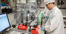 UC senior research associate Daewoo Han creates new fibers from coaxial electrospinning in a nanoelectronics lab at the University of Cincinnati.