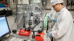 UC senior research associate Daewoo Han creates new fibers from coaxial electrospinning in a nanoelectronics lab at the University of Cincinnati.