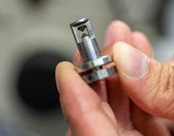 This diamond anvil cell compressing a sample between two opposing anvils, creating pressures greater than those at the center of the Earth. This diamond anvil cell compressing a sample between two opposing anvils, creating pressures greater than those at the center of the Earth.