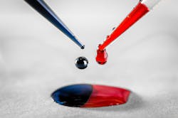 Polymer ink. The blue one is the donor polymer solution, while the red one is the acceptor polymer solution. When they meet each other, electrons from the donor polymer will automatically be transferred to the acceptor polymer, leaving free moving charges on both polymers. Polymer ink. The blue one is the donor polymer solution, while the red one is the acceptor polymer solution. When they meet each other, electrons from the donor polymer will automatically be transferred to the acceptor polymer, leaving free moving charges on both polymers.