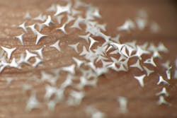 Ceramic STAR particles measuring about a millimeter in diameter are sharp enough to bore small holes in skin, letting drugs penetrate it more easily. Ceramic STAR particles measuring about a millimeter in diameter are sharp enough to bore small holes in skin, letting drugs penetrate it more easily.