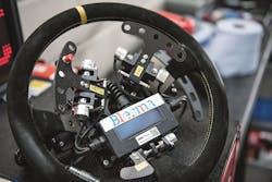 The specially adapted steering wheel can be removed easily if necessary and replaced with a regular one—which allows the racing car to be flexibly adapted for drivers with and without physical handicaps. The specially adapted steering wheel can be removed easily if necessary and replaced with a regular one—which allows the racing car to be flexibly adapted for drivers with and without physical handicaps.