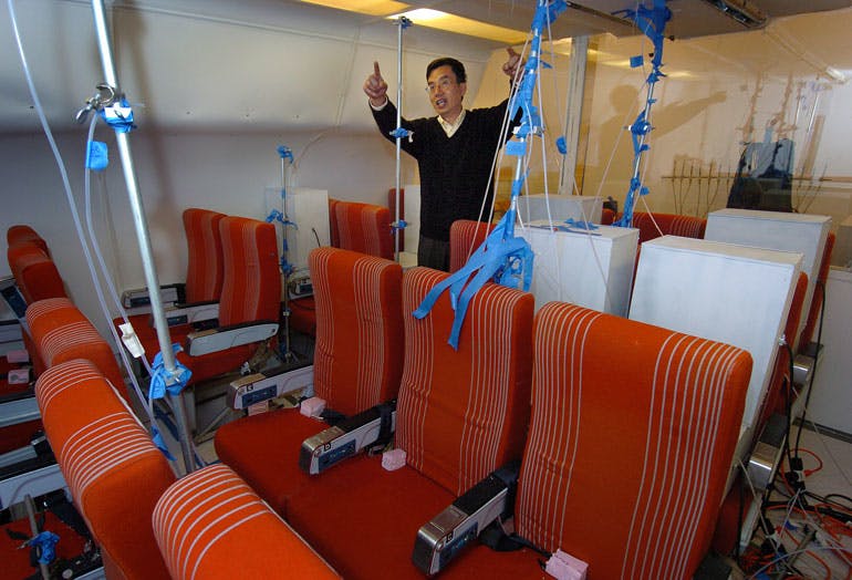Qingyan Chen recreates the passenger compartment of a commercial airliner. His research aims to develop a system that uses mathematical models and sensors to locate passengers releasing hazardous materials or pathogens inside airline cabins.