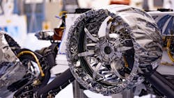 This wheel, and five others just like it, heads to Mars on NASA&rsquo;s Perseverance rover this summer. Wrapped in a protective antistatic foil that will be removed before launch, the wheel is 20.7 in. (52.6 centimeters) in diameter. The image was taken on March 30, 2020, at NASA&apos;s Kennedy Space Center.