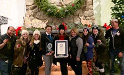 Most couples kissing under the mistletoe Most couples kissing under the mistletoe