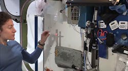 NASA astronaut Jessica Meir demonstrates how the LEctenna, a light-emitting rectifying antenna constructed by the U.S. Naval Research Laboratory, converts electromagnetic waves into electric current on the International Space Station. NASA astronaut Jessica Meir demonstrates how the LEctenna, a light-emitting rectifying antenna constructed by the U.S. Naval Research Laboratory, converts electromagnetic waves into electric current on the International Space Station.