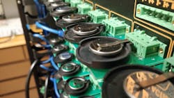 This battery cycler in UT labs let researchers test several coin-cell batteries at the same time. This battery cycler in UT labs let researchers test several coin-cell batteries at the same time.