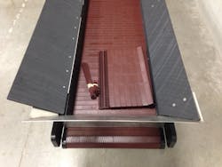 The brownish high-temperature nylon conveyor belt is modular and can quickly be repaired to minimize downtime. The brownish high-temperature nylon conveyor belt is modular and can quickly be repaired to minimize downtime.