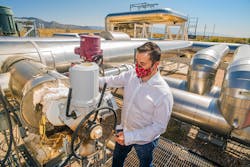 Principal investigator Ken Armijo checks for deterioration of a molten salt valve from corrosion at Sandia National Laboratories&rsquo; Molten Salt Test Loop.
