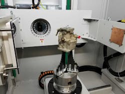 Part mounting and system geometry for carburetor CT scan. Part mounting and system geometry for carburetor CT scan.