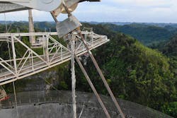 A drone view of a damaged cable at the Arecibo Observatory after a second cable failed. A drone view of a damaged cable at the Arecibo Observatory after a second cable failed.