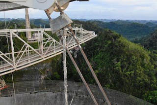 A drone view of a damaged cable at the Arecibo Observatory after a second cable failed.