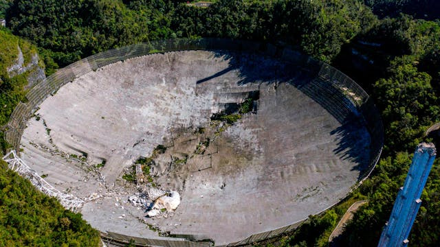 The already damaged radar dish at the Arecibo Observatory in Puerto Rico collapsed Dec. 1 following two cable breaks over the last four months.