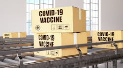 COVID-19 vaccine on conveyor belt