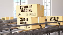 COVID-19 vaccine on conveyor belt COVID-19 vaccine on conveyor belt