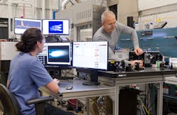 Argonne researchers Joseph Libera and Anthony Stark prepare for in-situ Raman spectroscopy to help improve their new approach to pyrolysis. Argonne researchers Joseph Libera and Anthony Stark prepare for in-situ Raman spectroscopy to help improve their new approach to pyrolysis.