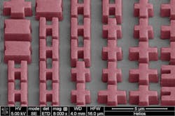 This magnified view of a metalens shows its microscopic features. This magnified view of a metalens shows its microscopic features.