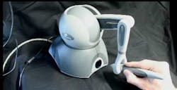 4. A specialized “joystick” control arm is used for precise steering of the mirrors and beam. 4. A specialized “joystick” control arm is used for precise steering of the mirrors and beam.