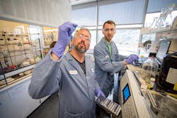 Brett Helms, foreground, pictured at work in the Molecular Foundry developing PDK and the processes to make it. Brett Helms, foreground, pictured at work in the Molecular Foundry developing PDK and the processes to make it.
