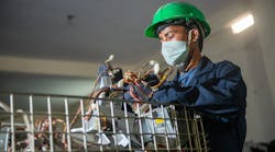 Worker disposing of a product