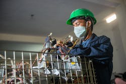 Worker disposing of a product Worker disposing of a product