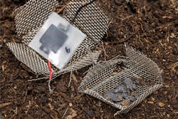 After two months buried in the soil, the capacitor has disintegrated, leaving only a few visible carbon particles. After two months buried in the soil, the capacitor has disintegrated, leaving only a few visible carbon particles.