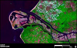 This image from Landsat 8 taken on Sept. 13, 2016, shows the port of Rotterdam and the completed Maasvlakte 2 project (the roundish red area on the left). It added about 5,000 acres of new land to the port. This image from Landsat 8 taken on Sept. 13, 2016, shows the port of Rotterdam and the completed Maasvlakte 2 project (the roundish red area on the left). It added about 5,000 acres of new land to the port.
