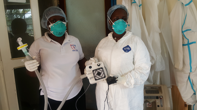 Staff at the Mengo Hospital, Uganda, with the prototype breathing device