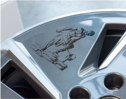 Laser processing combined with automated part handling lets companies mark parts such as this automotive wheel with intricate designs. Laser processing combined with automated part handling lets companies mark parts such as this automotive wheel with intricate designs.