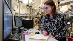Katie Sautter, a postdoctoral researcher at Argonne National Laboratory, builds materials for quantum devices using a molecular beam epitaxy machine.